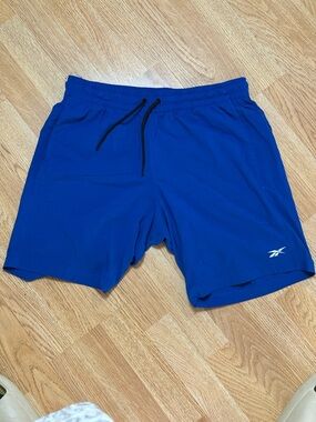 Reebok Men's Royal Blue Athletic Shorts with Black Drawstring